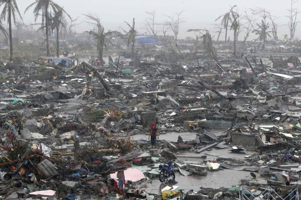 The devastation wreaked by Super Typhoon Haiyan on the city of Tacloban in the central Philippines. Scientists say storms are becoming more intense because of global warming. Photos: AFP; K.Y. Cheng; Dickson Lee; EPA; Edward Wong
