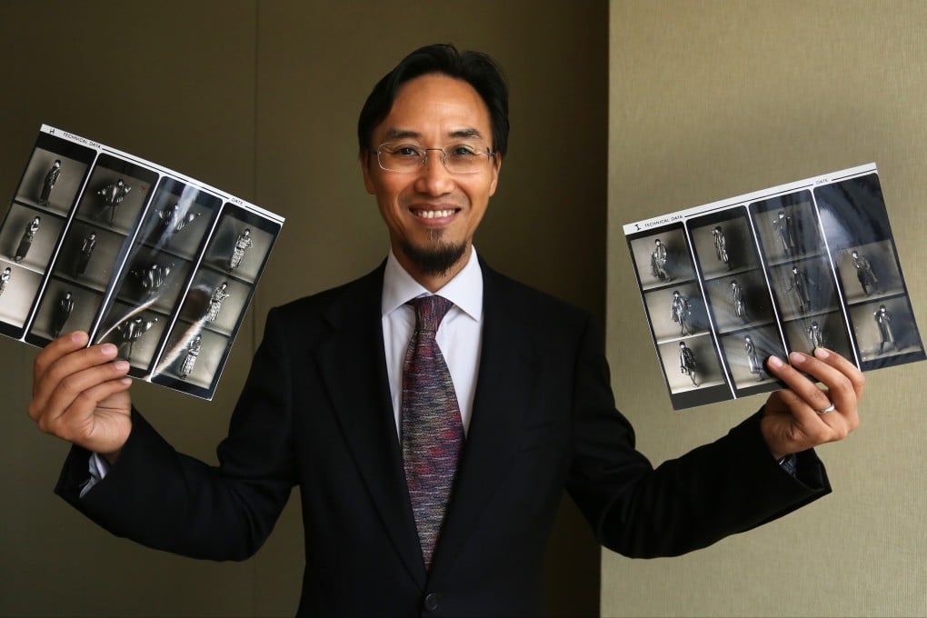 Hong Kong Investment Funds Association chairman Bruno Lee showing his works from in his earlier days as a fashion designer. Photo: Jonathan Wong