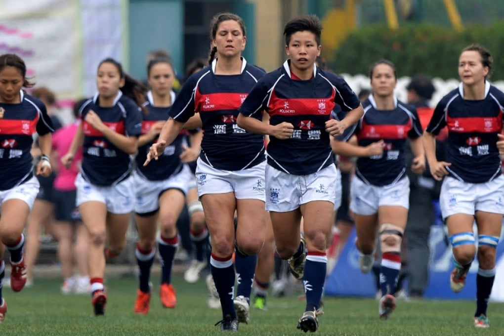 Hong Kong women's sevens captain Royce Chan (centre right) is looking forward to a busy summer of international competition for her side. Photo: HKRU