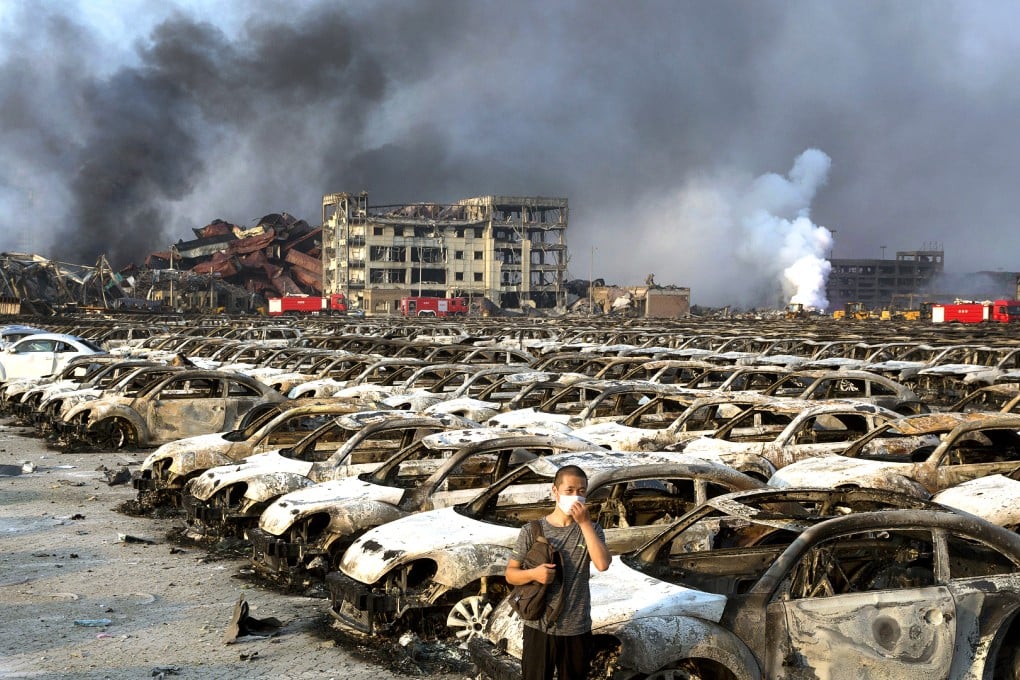 Charred remains of new cars at a parking lot near the site of an explosion at a warehouse in Tianjin. Photo: AP