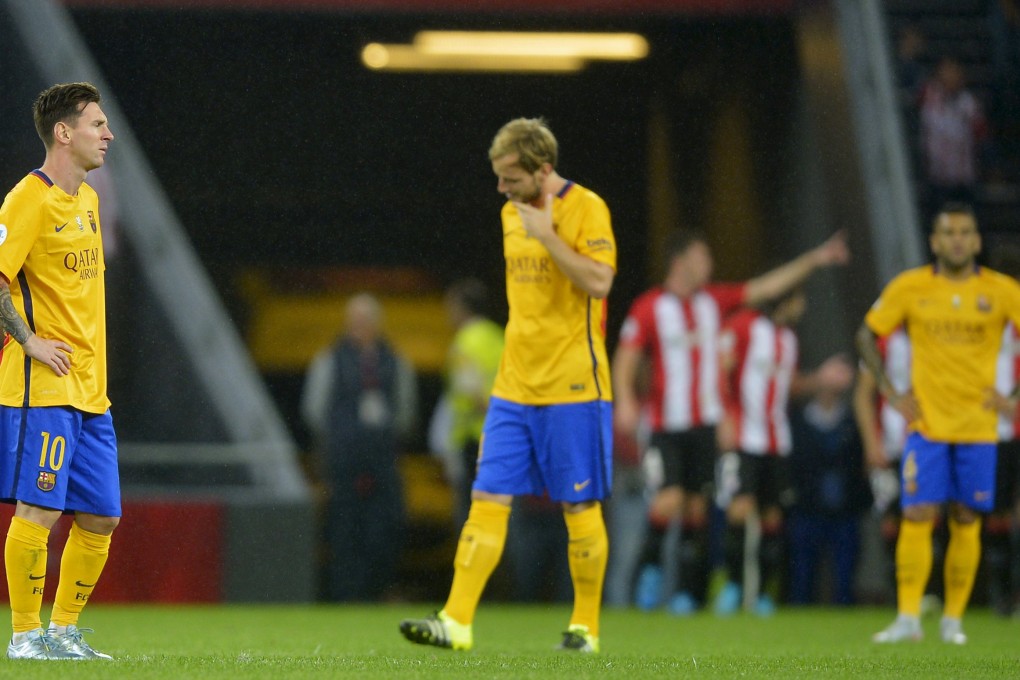 Barcelona's Ivan Rakitic and Lionel Messi look on stunned as they are blown away by Athletic Bilbao in the Spanish Super Cup first leg. Photo: Reuters