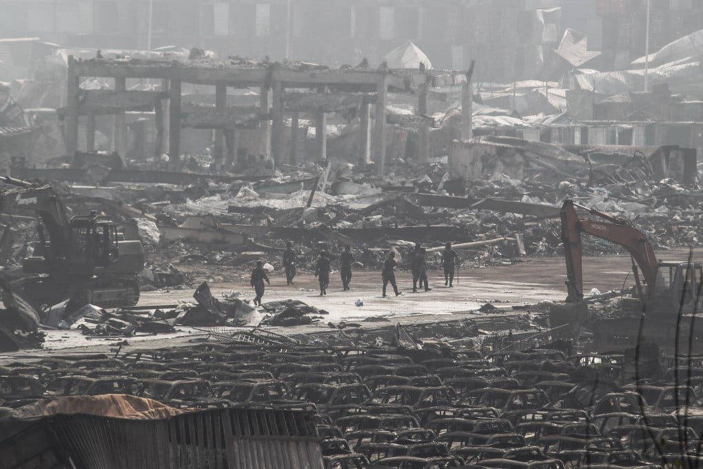 Rescuers work at the explosion site in north China's Tianjin Municipality. Photo: Xinhua