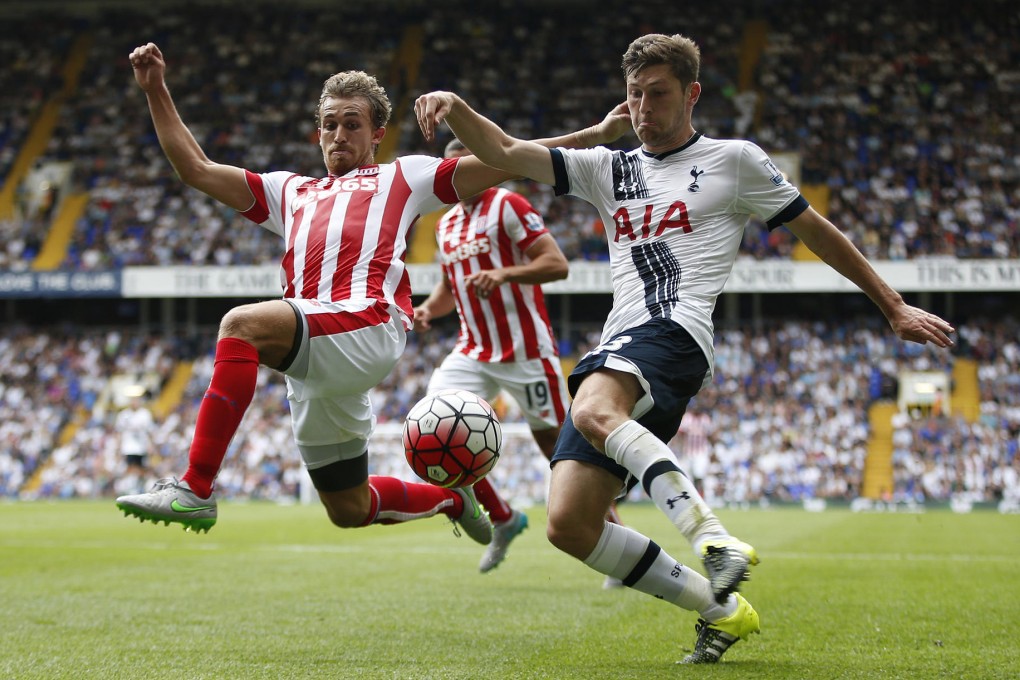 Spurs' Ben Davies tussles with Stoke's Marc Muniesa. Photo: Reuters