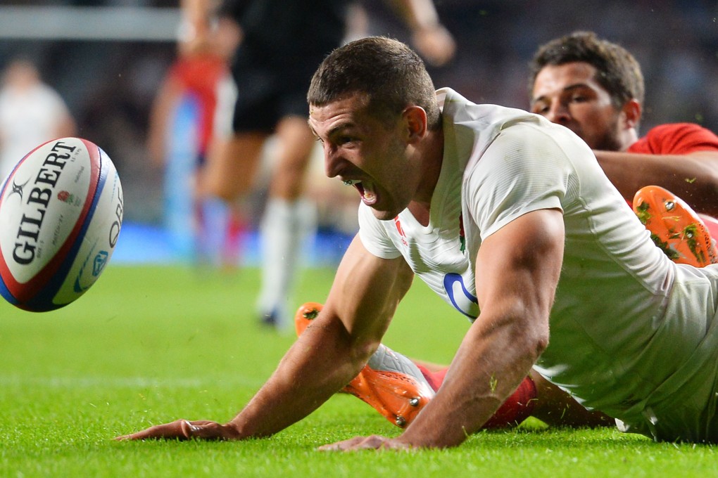 England winger Jonny May misses a try-scoring opportunity during a Rugby World Cup warm-up match against France on Saturday at Twickenham. Photo: AFP