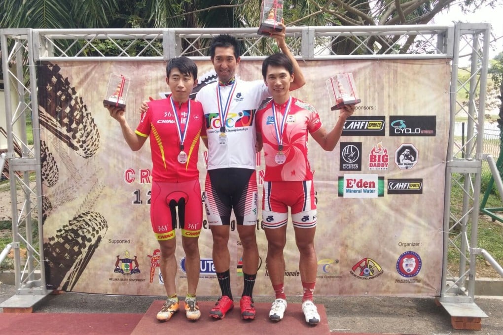 Hong Kong's Chan Chun-hing (right) with winner Kohei Yamamoto and Wang Zhen of China after their race at the Asian Championships in Malaysia. Photo: SCMP Pictures