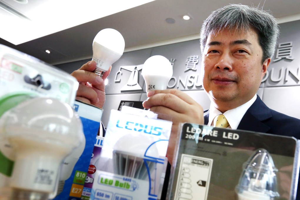 Philip Leung, vice chairman of Hong Kong Consumer Council , advises customers to be cautious when choosing LED light bulbs which vary greatly in energy saving performance. Photo: Nora Tam