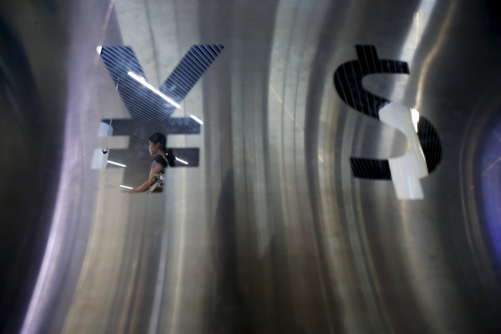 China's renminbi (RMB) or yuan and the US dollar are seen outside a   foreign exchange store in Shanghai as the cost of a weaker yuan may well outweigh its benefits. Photo: Reuters