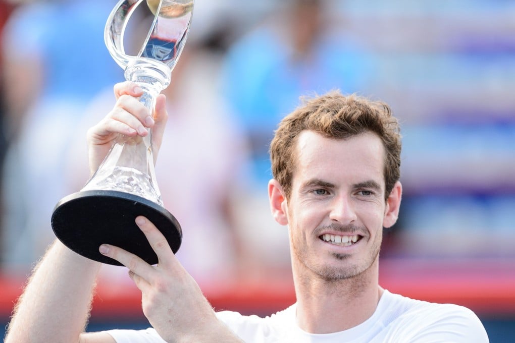 Andy Murray  holds up the Rogers Cup after defeating Novak Djokovic in the Montreal Masters final. Photo: AFP