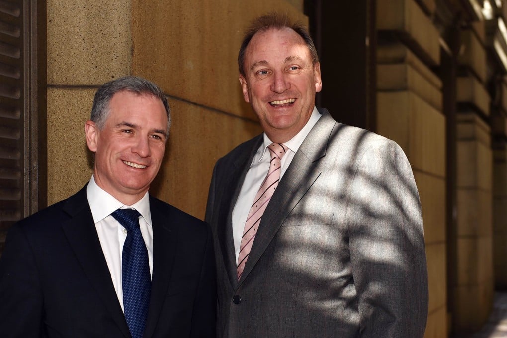 Brookfield Infrastructure Partners chief executive Sam Pollock (left) and Asciano chief executive John Mullen after a press conference in Sydney on Tuesday. Photo: AFP