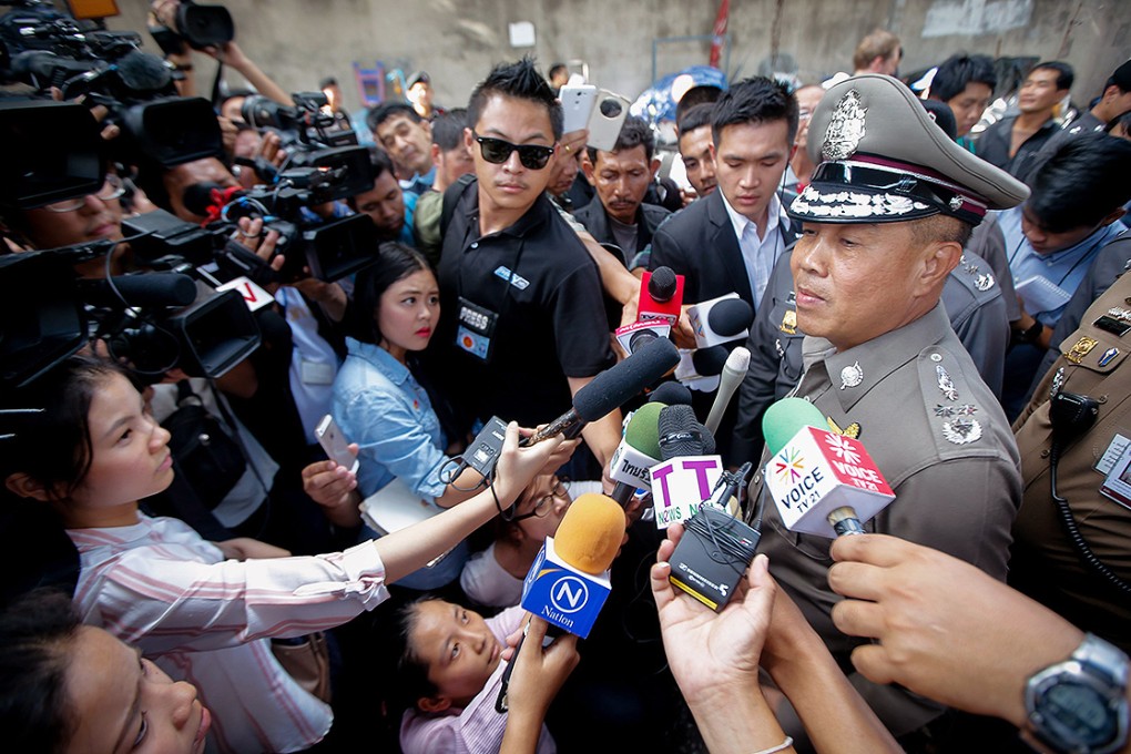 National police chief Somyot Pumpanmuang talks to journalists at Sathorn Pier, Bangkok. Photo: EPA