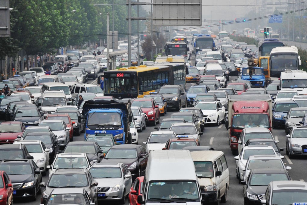 A traffic jam in Beijing as the country's automobile industry faces long-term headwinds which may force consolidation in the industry. Photo: Xinhua
