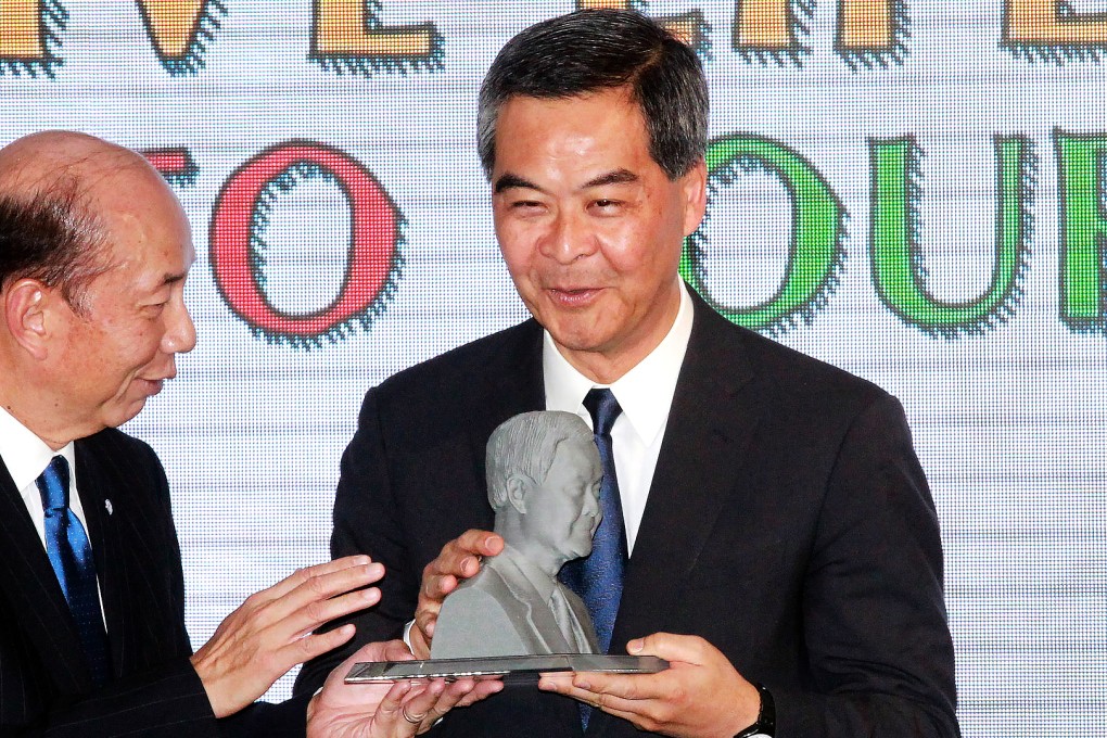 Productivity Council Chairman Stanley Lau Chin-ho (left) and Chief Executive Leung Chun-ying at the launch in Kowloon Tong. Photo: May Tse