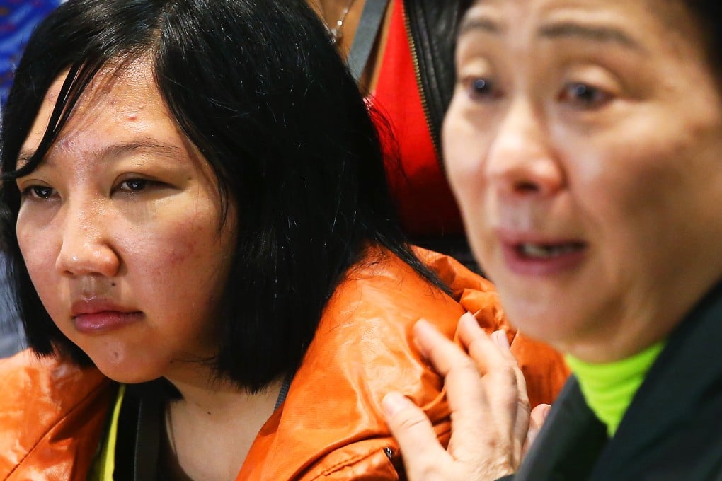 Domestic helper Erwiana with Democrat lawmaker Emily Lau. Photo: David Wong