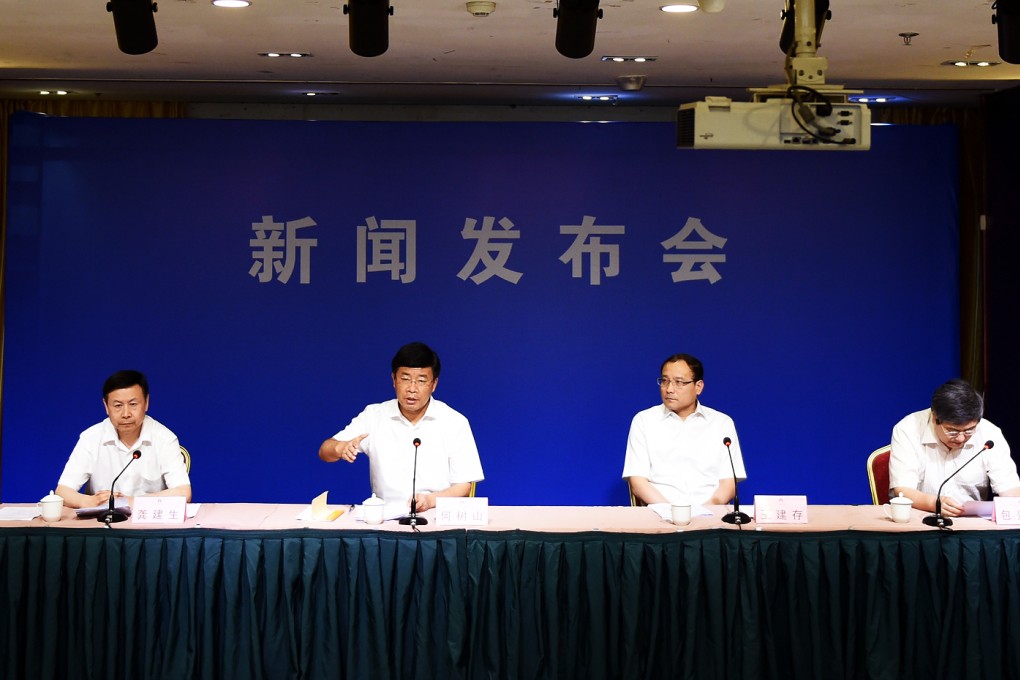 Officials in Tianjin brief the press on relief efforts. The People's Daily said that earlier briefings by cadres in the city were "less than satisfactory". Photo: Xinhua