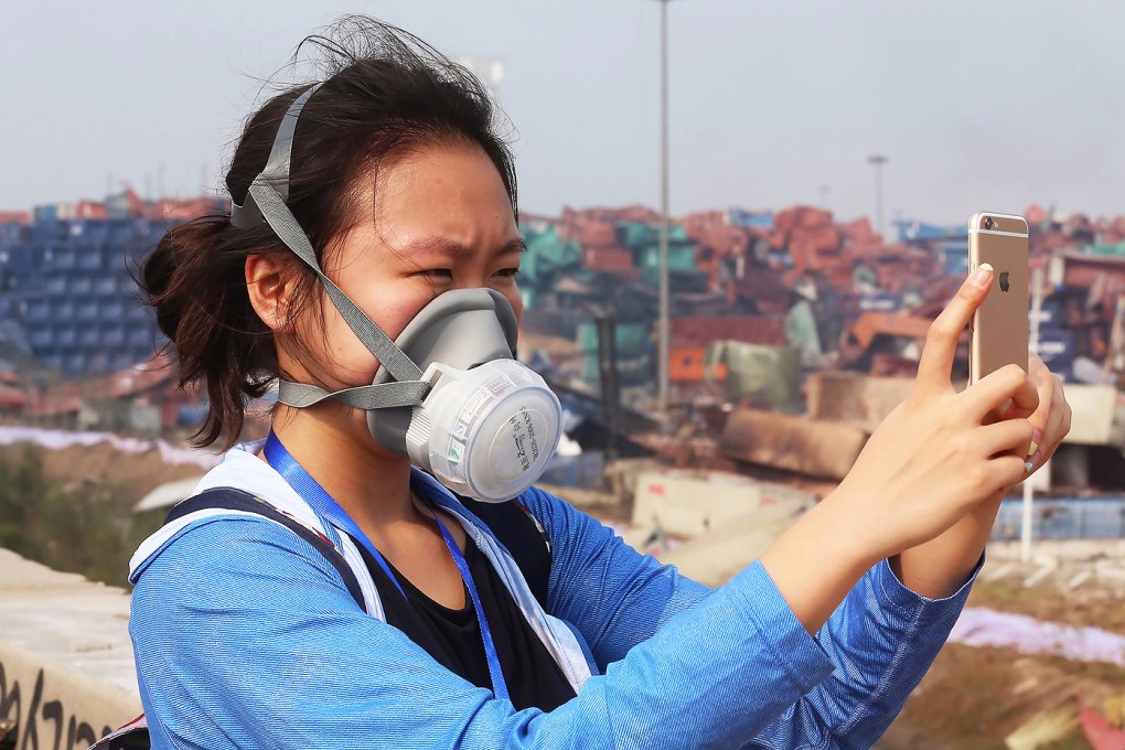 SCMP reporter Keira Lu Huang visits the Tianjin blast site. Photo: KY Cheng