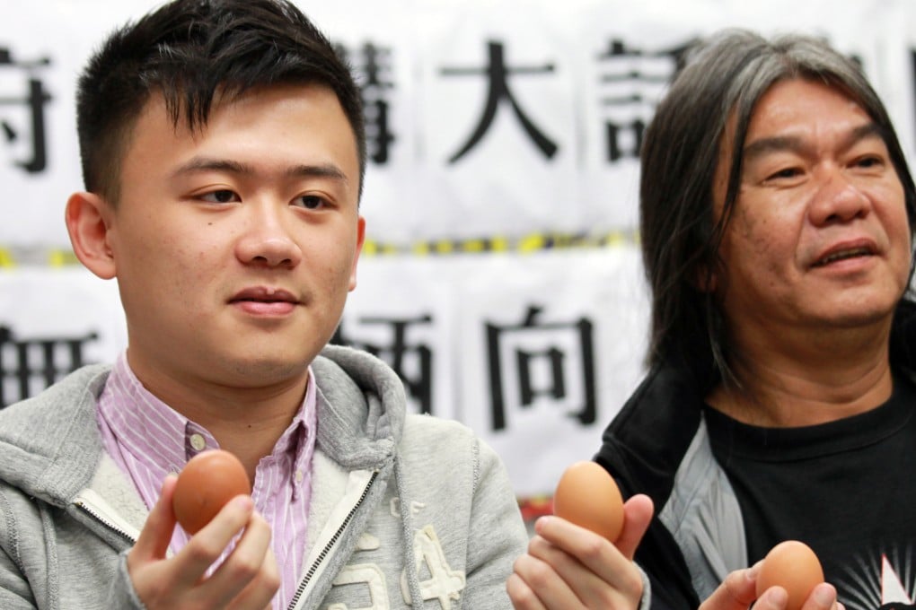 Derek Chan Tak-cheung (left), with 'Long Hair' Leung Kwok-hung, has twice this week filed applications against the Correctional Services Department regarding his 2013 conviction of common assault. Photo: SCMP Pictures