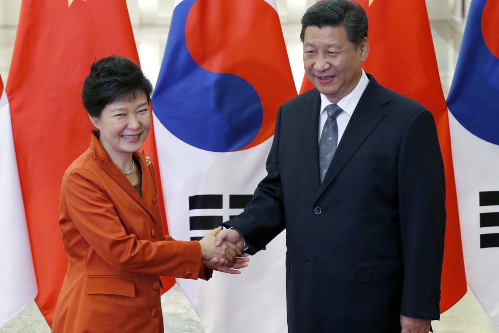 South Korea's President Park Geun-Hye pictured with Xi Jinping at an Apec summit in Beijing last year. Photo: AP