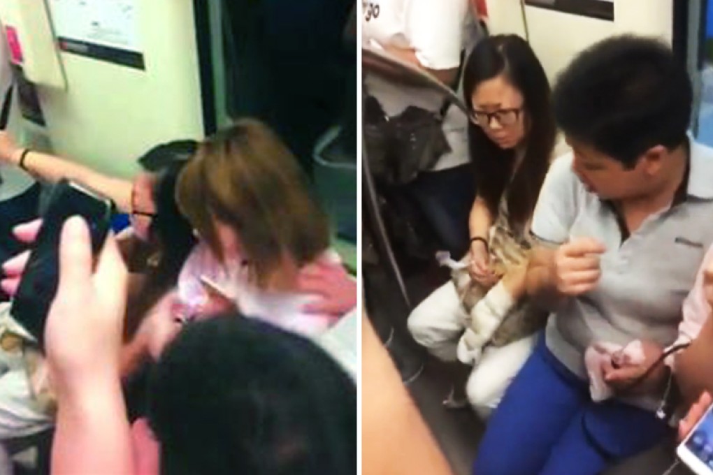 A passenger, far left, pushes a girl out of her seat on the train. She is then confronted by a woman passenger, far right. Photo: Shanghai Morning Post