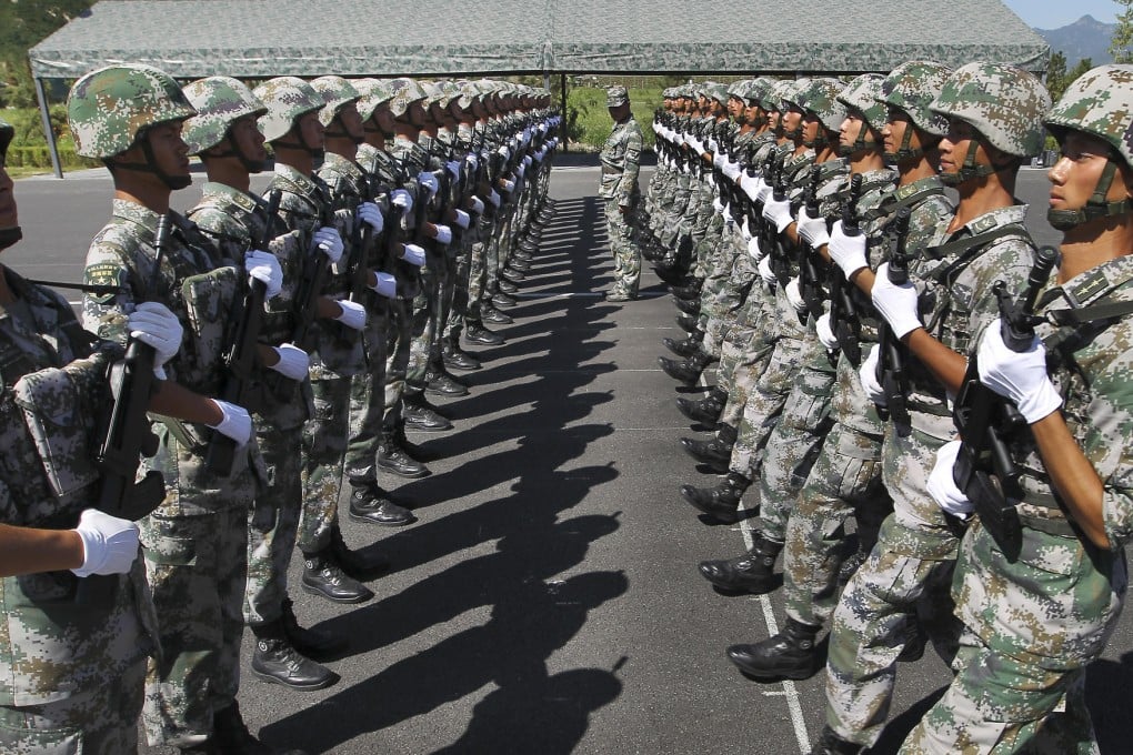 Soldiers take part in parade drills while parts of the capital are locked down ahead of today's rehearsal.Photos: Simon Song