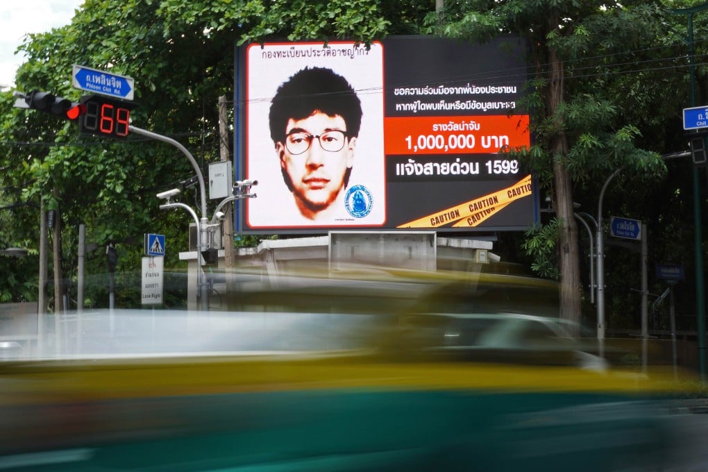 A digital billboard showing the sketch of a man suspected to be the Bangkok bomber. Photo: AFP