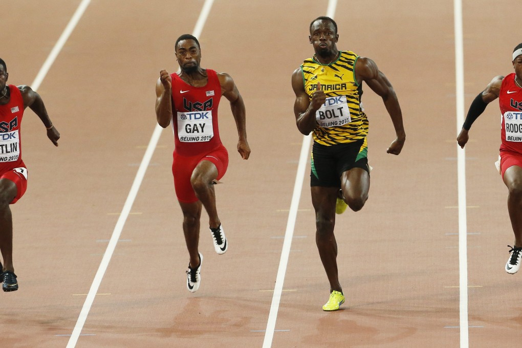 Jamaica's Usain Bolt on his way to winning the gold medal, ahead of arch rival Justin Gatlin (left) in the men's 100m final at the World Athletics Championships in Beijing. Photo: EPA
