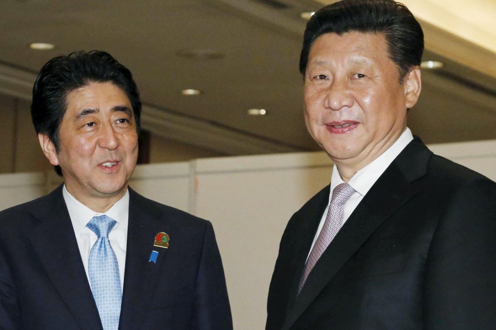 Ties between China and Japan have thawed slightly since Japanese Prime Minister Shinzo Abe (left) and President Xi Jinping met at multilateral gatherings in April and last November. Photo: Reuters