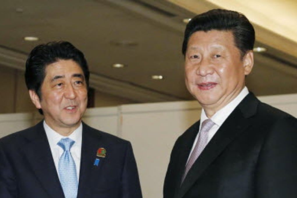 While not exactly the best of friends, Shinzo Abe (left) and Xi Jinping understand how important Sino-Japanese relations are. Photo: AP