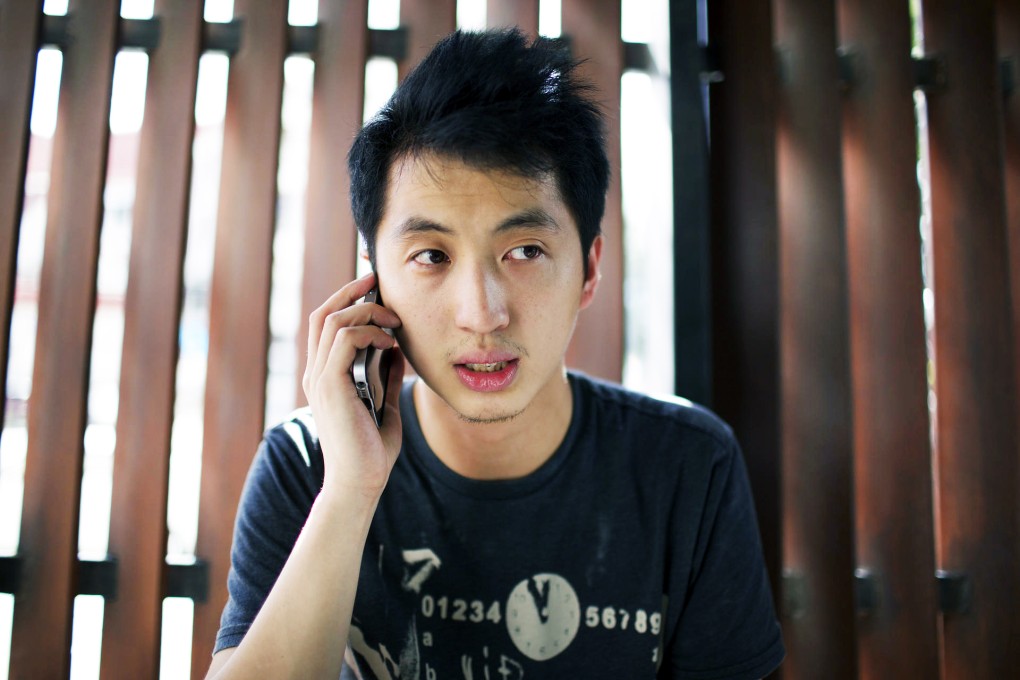 Photojournalist Anthony Kwan outside court in Bangkok yesterday after being released on bail. He had to surrender his passport. Photo: AP