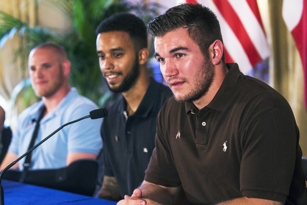 From left to right, U.S. Ambassador to France Jane Hartley, U.S. serviceman Spencer Stone, U.S. student Anthony Sadler and U.S. serviceman Alek Skarlatos attend a press conference at the U.S. embassy in Paris, France, on August 23, 2015. Photo: EPA