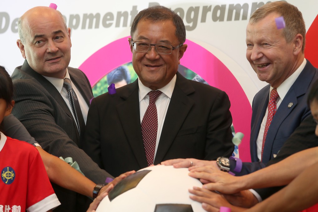Hong Kong Football Association CEO Mark Sutcliffe (left), HKFA chairman Brian Leung and Jockey Club CEO Winfried Engelbrecht-Bresges at a media conference to promote a five year soccer development programme. Photos: K.Y. Cheng
