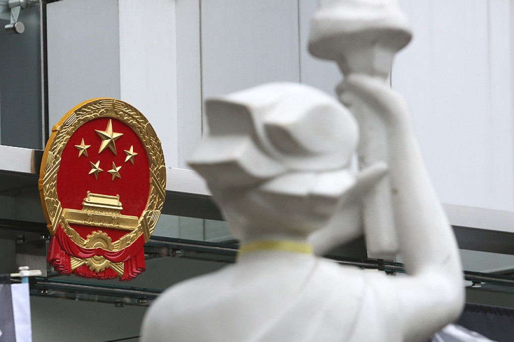 More and more Hong Kong residents were surprised to received a call from the central government's liaison office. These turned out to be the phone scam cases recently plaguing the city, wrangling some HK$56.7 million in two weeks. Photo: Sam Tsang