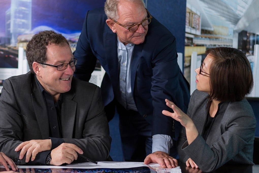 Graham Cartledge (centre) says Benoy has not made any pay cuts or lay-offs despite business slowing on the mainland. Photo: SCMP Pictures