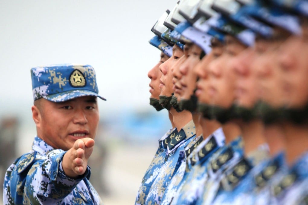 The PLA Navy technician is said to have kept his eyes open without blinking for more than 57 minutes. Photo: Xinhua