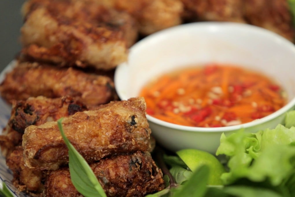 Vietnamese spring rolls. Use a canned soft drink as part of the dipping liquid; the sugar in the drink caramelises as the spring rolls are fried, giving them an attractive brown colour. Photos: Robin Fall