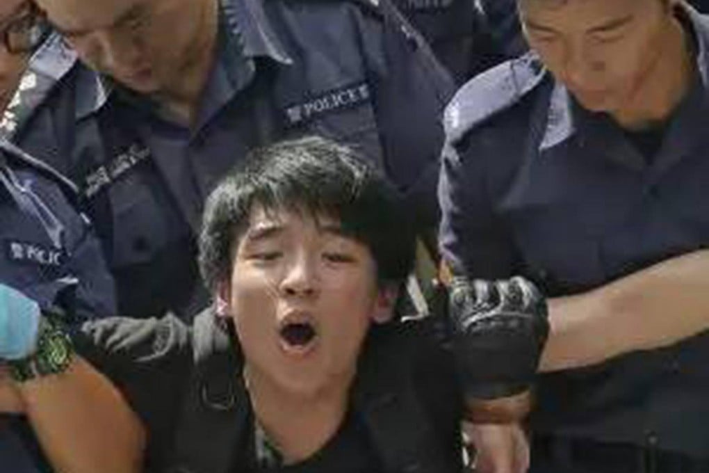 Law Cheuk-yung during his arrest.Photo: SCMP Pictures