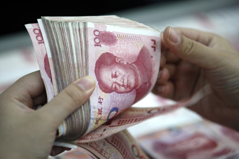 China's local government debt rose by about 700 billion yuan in the 18 months from June 2013, according to a Caixin report. Photo: EPA