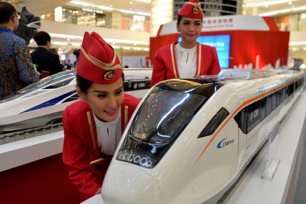 Models of Chinese bullet trains on display in Jakarta. Photo: AFP
