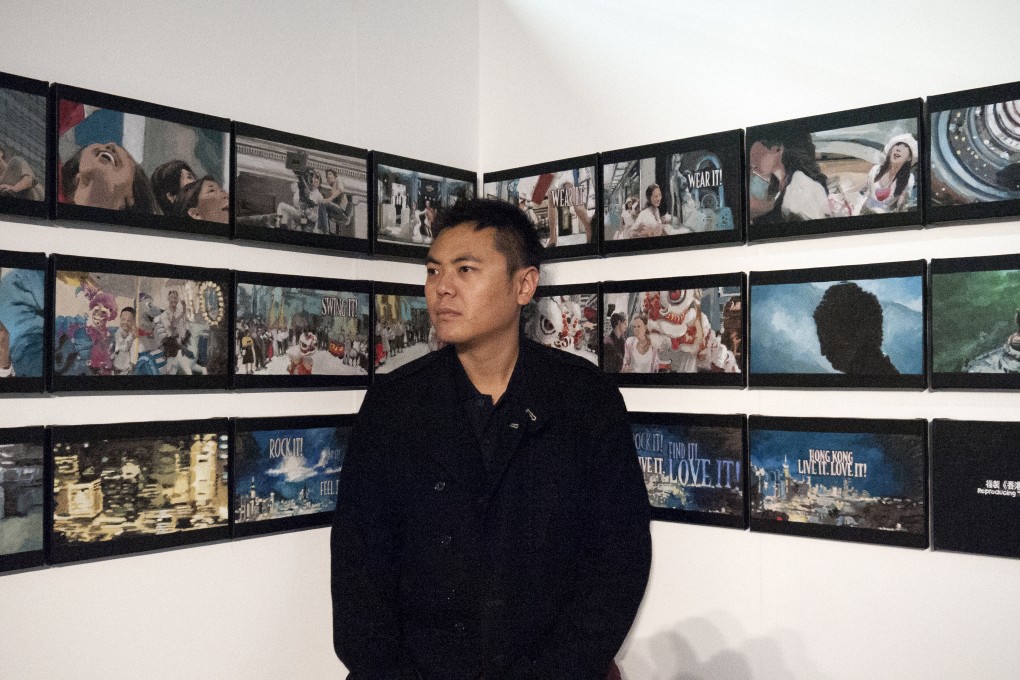 Chow Chun-fai with his work Reproducing 'Hong Kong - Live it, Love it!'‚ part of the Hong Kong pavilion of the Liverpool Biennial 2012.