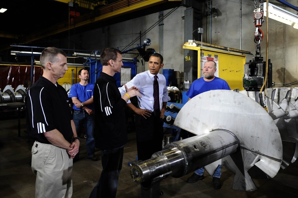 US President Barack Obama at a tour of a factory in Iowa. Photo: AFP