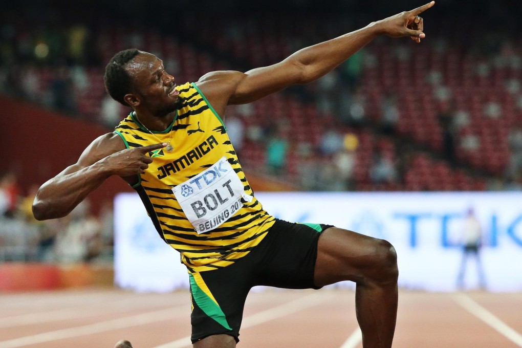 Jamaican sprinter Usain Bolt celebrates winning the 200m men's world championship title with his signature pose at the Bird's Nest stadium in Beijing. Photo: EPA