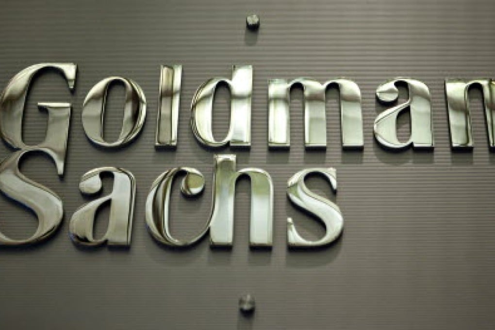 A Goldman Sachs Group logo hangs on the floor of the New York Stock Exchange in New York. Photo: Bloomberg