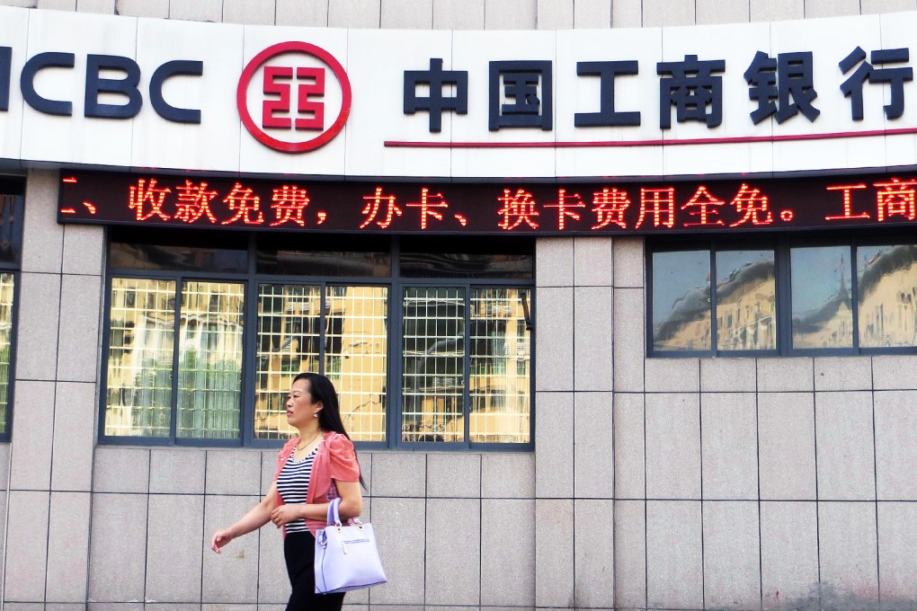 This is the second time since 2009 that ICBC has posted negative quarterly profit growth and a sign that China’s massive state-owned banks are feeling the pressure of a slowing economy. Photo: AFP
