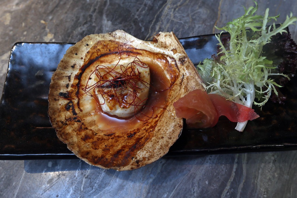 Scallop on the half shell. Photo: David Wong