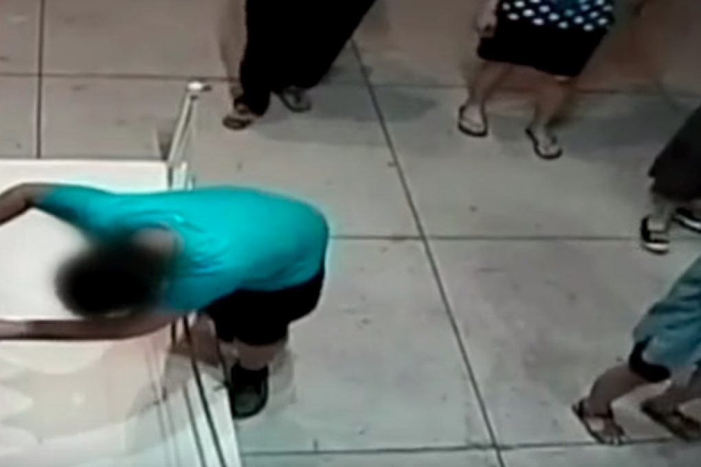 A 12-year-old boy holding a drink in his hand tripped at a museum in Tawan and broke his fall with a painting, smashing a fist-sized hole in it. The piece was worth $1.5 million.