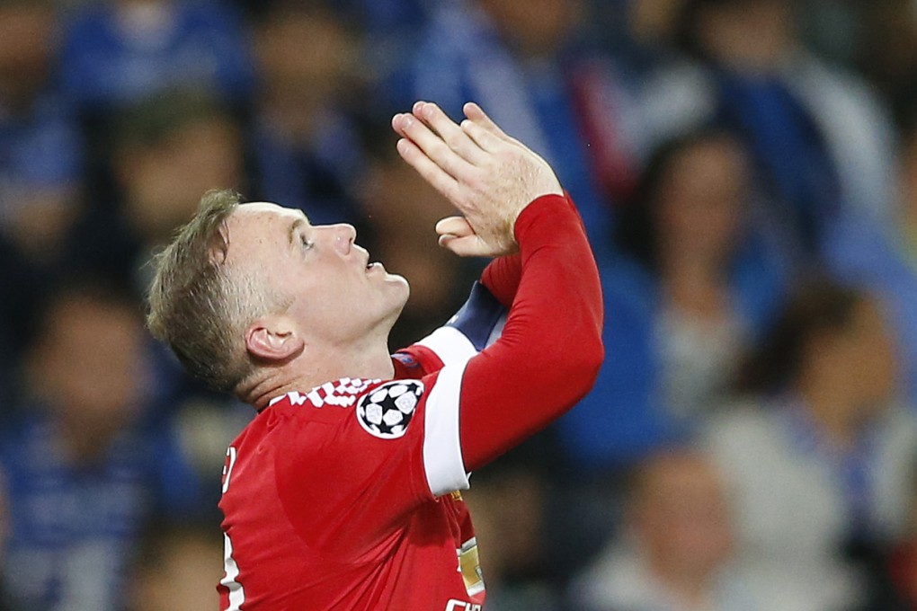 Rooney celebrates his second goal. Photo: Reuters