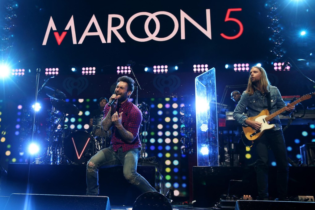 Adam Levine (left) and James Valentine onstage at Madison Square Garden in New York last December. Photo: AFP