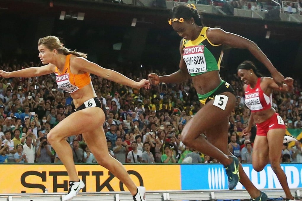 Dafne Schippers wins the 200m final to deny Jamaican Elaine Thompson gold, becoming the third fastest in history. Photo: EPA