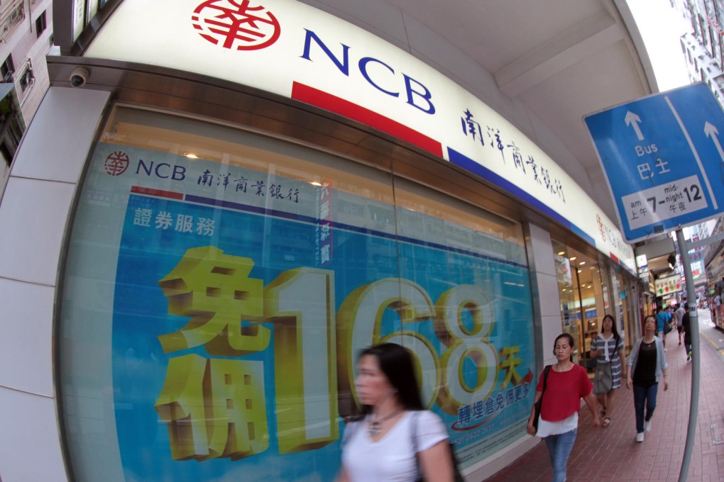 Deal would see bad debt manager pick up Hong Kong and mainland banking permits. Photo: Bruce Yan