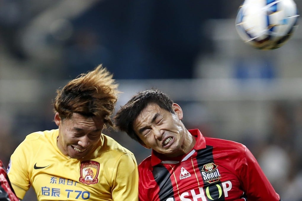 Zhang Lingpeng (left) in action for Guangzhou in the Asian Champions League. Photo: Reuters