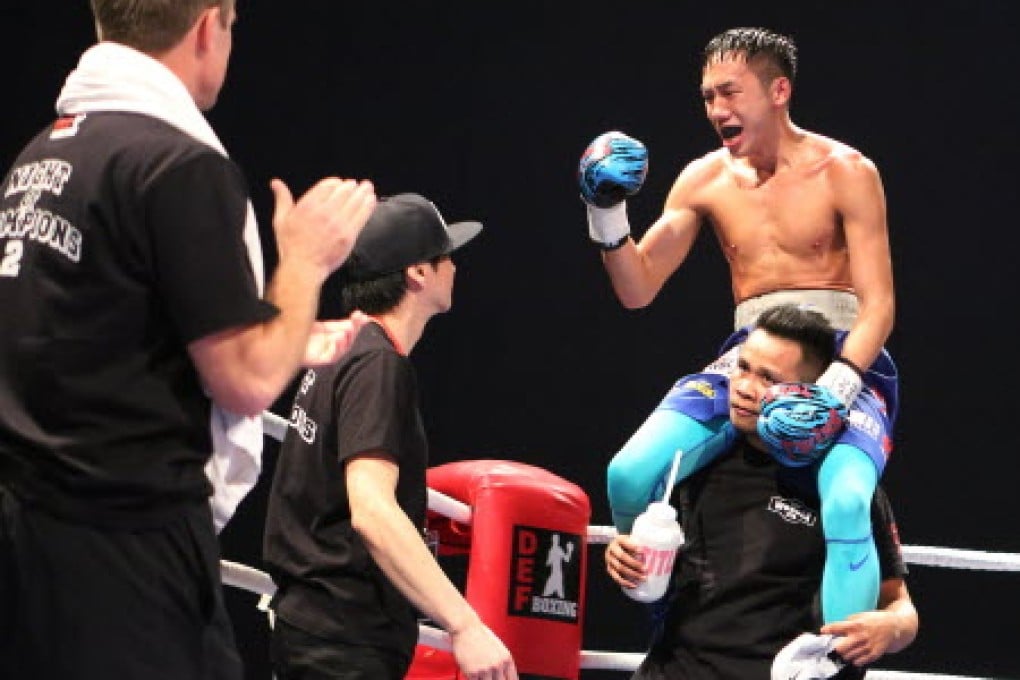 Rex Tso sits on the shoulders of trainer Jake Verano after his seventh-round TKO win against Brad Hore. Photo: Edward Wong